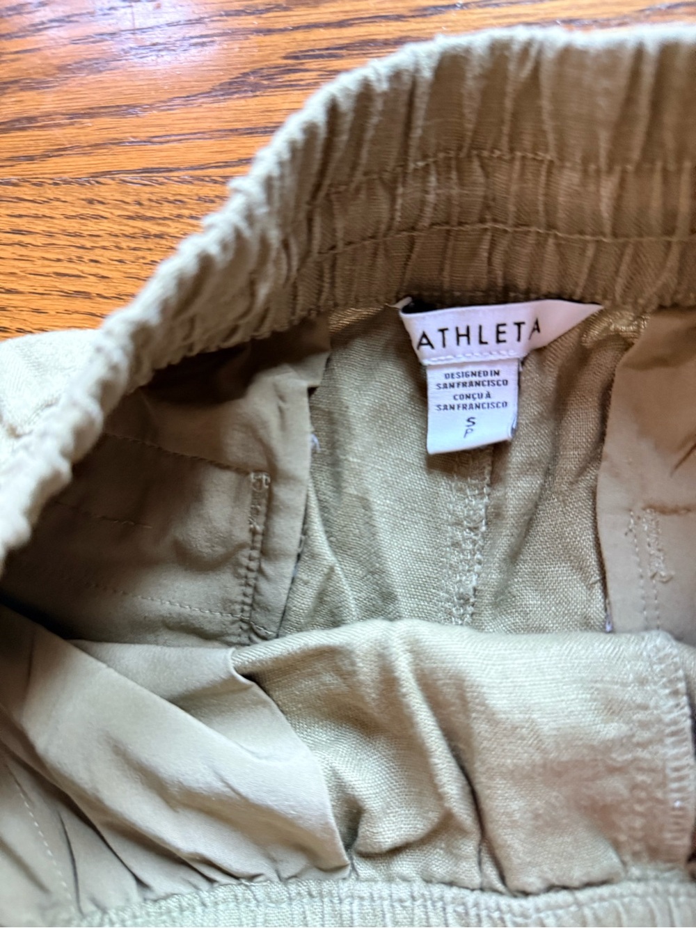 Athleta Olive Green Linen shorts. Size S. Zip pockets. Elastic waist/ tie. EUC - Picture 6 of 7
